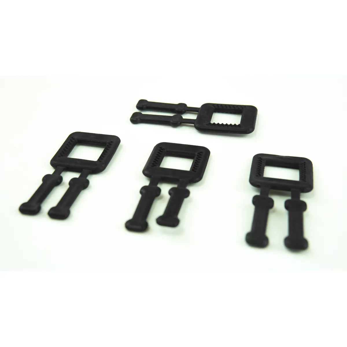 Dettaglio delle fibbie nere in plastica BUCKLES-4P per reggia PP da 12 mm
