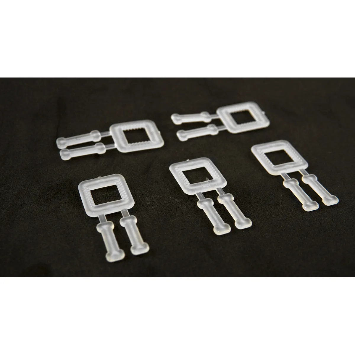 Fibbie bianche in plastica per reggia in PP (BUCKLES-5P) 12 mm
